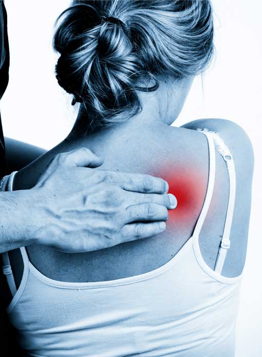 Patient receiving Active Release Technique therapy on right shoulder.