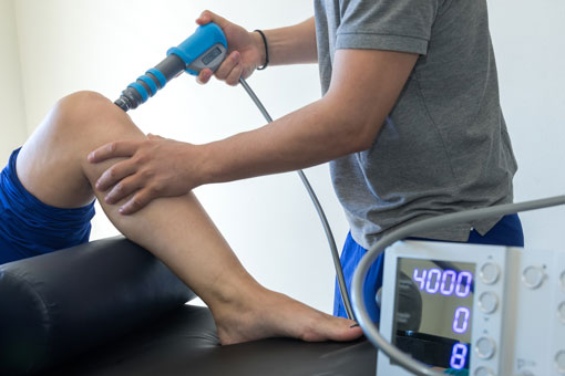 Physical therapy of the knee and the foot using shock wave therapy.